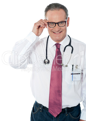 Mature medical professional, indoors studio shot