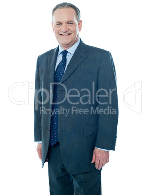 Senior business executive posing in front of camera