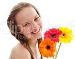 Happy girl with orange flower