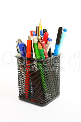 Pencil cup filled with colorful used pens and pencils