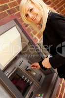 beautiful smiley bussineswoman with cash mashine