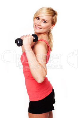 Pretty girl keeping her beautiful shape exercising