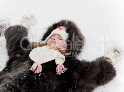 little girl on the snow