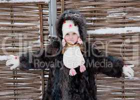 little girl at fence