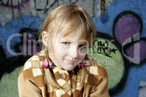 little girl and graffiti