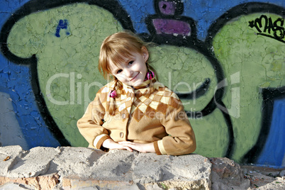 little girl and graffiti