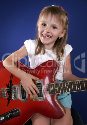 little girl and guitar