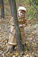 little girl in forest