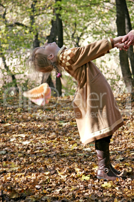 little girl in forest