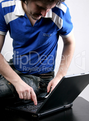 man work with laptop