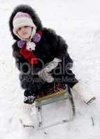 girl on sledge