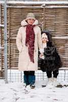 mother and daughter in winter