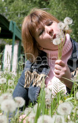 woman and dandelion