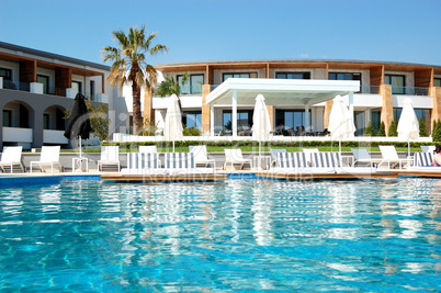 Swimming pool by a beach at the modern luxury hotel, Pieria, Gre