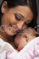 Attractive Ethnic Woman with Her Newborn Baby