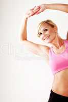 Smiling blonde woman working out