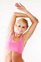 Happy woman doing her fitness exercises
