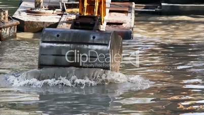 Bucket dredging machines