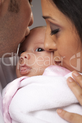 Mixed Race Young Family with Newborn Baby