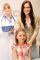 Daughter and mother at the pediatrician office