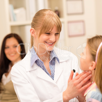 Pediatrician examine child throat cold prevention