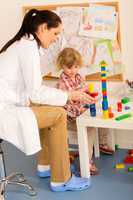 Visit at pediatrician child girl playing