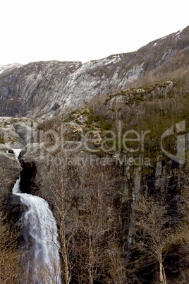 waterfall in mountains of norway