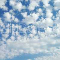 white fluffy clouds in the blue sky