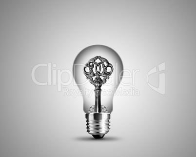 Old key in light bulb