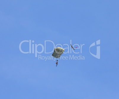 RC glider flies around jumper