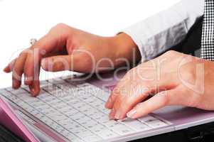 woman's  hands on laptop