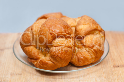 fresh baked french croissant brioche on wood board