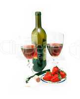 red wine bottle and two glasses with strawberries