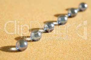 Glass Balls On Sand