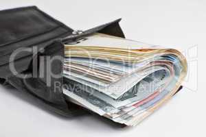 many banknotes in wallet