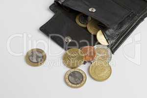 loose cash falling out of black wallet