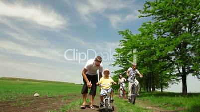 Family Riding Bicycles