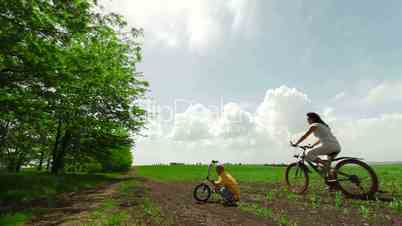 Mother and child riding on a bicycle