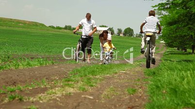 Young Family Riding Bikes