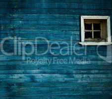 Blue wooden wall, window