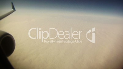 Aerial view of clouds from jet plane timelapse