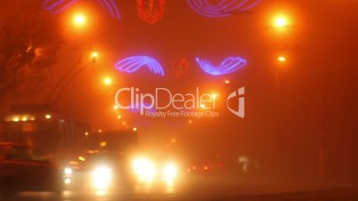 Traffic timelapse in the foggy night