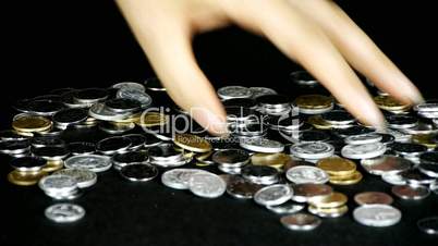 catch a group of coins by hand.