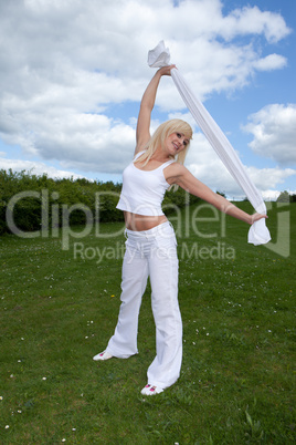 Athletic woman doing stretching exercises