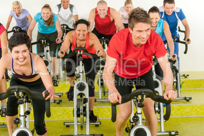 Spinning class sport people exercise at gym