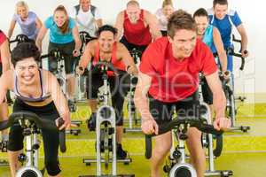 Spinning class sport people exercise at gym