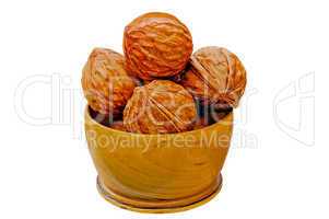 Walnuts from juniper wood in a vase