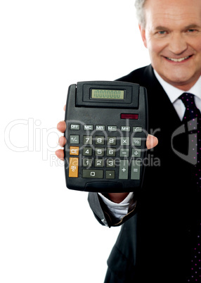 Cropped image of a businessman showing calculator