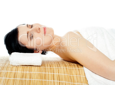 Beautiful young woman at a spa salon