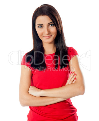 Pretty teenager posing with folded arms